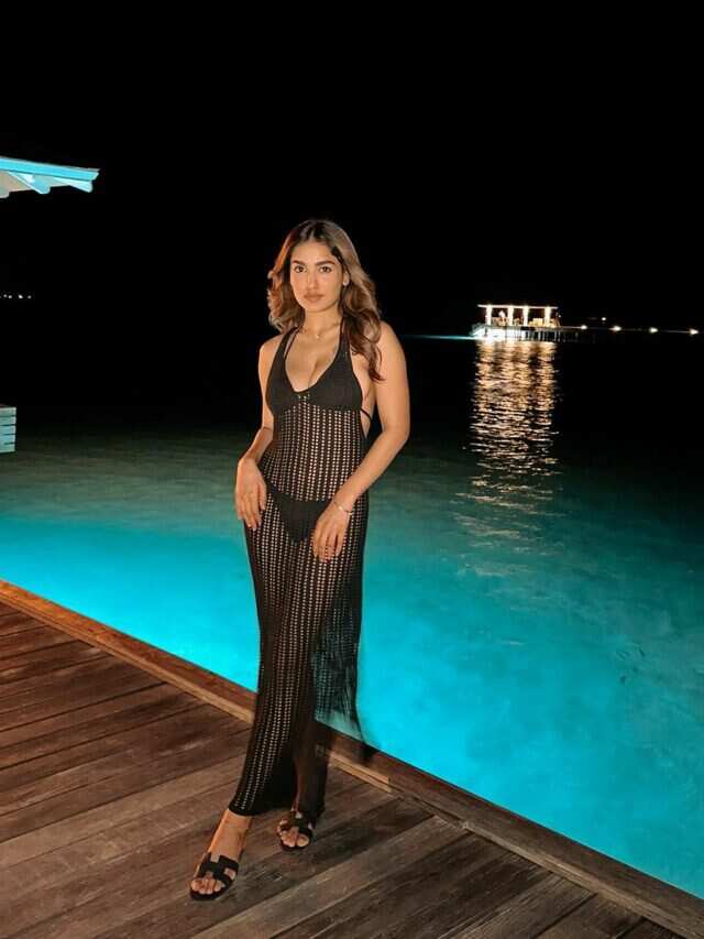 Malayalam Actress Saniya Iyappan Stuns In Black Netted Mesh Swim Cover Up