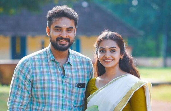 Tovino Thomas and Tanvi Ram in a still from 2403FT