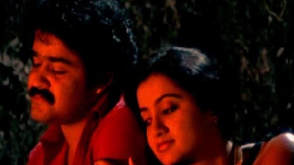 Mohanlal as Jayakrishnan and Sumalatha as Clara in Thoovanathumbikal