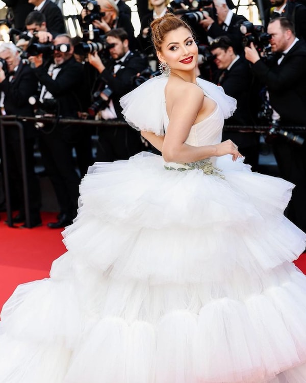 Urvashi debuted in Cannes 2022 with a while ruffle gown.