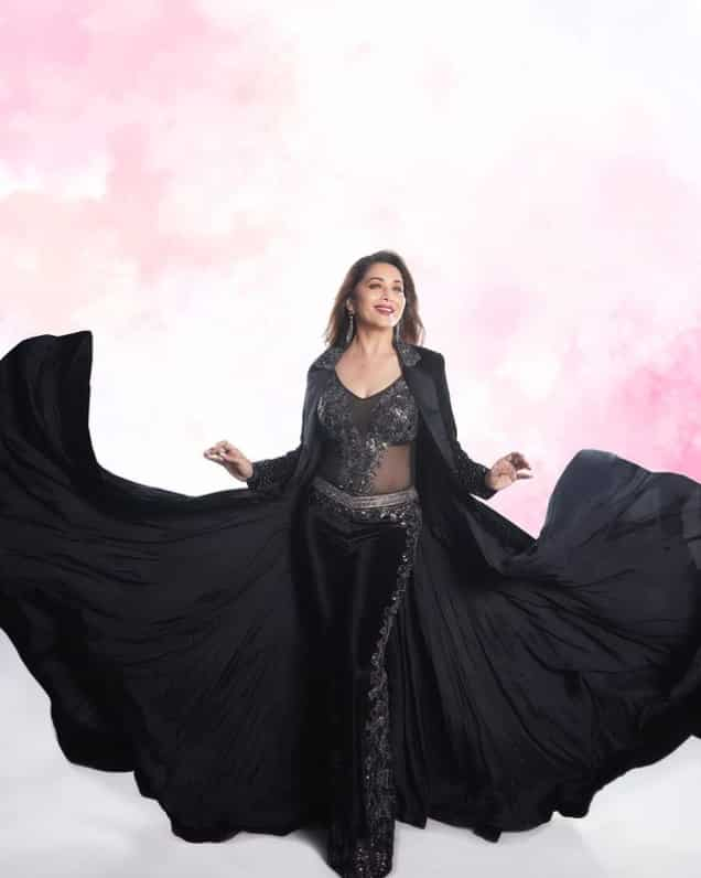 The Dhak Dhak girl's all-black attire, which is also the signature dress of her upcoming album track Tu Hai Mera, is giving major fashion goals. 