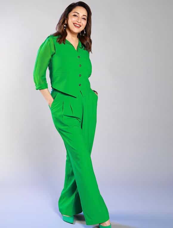 Along with style, Madhuri promotes comfort and class with her all-green attire.