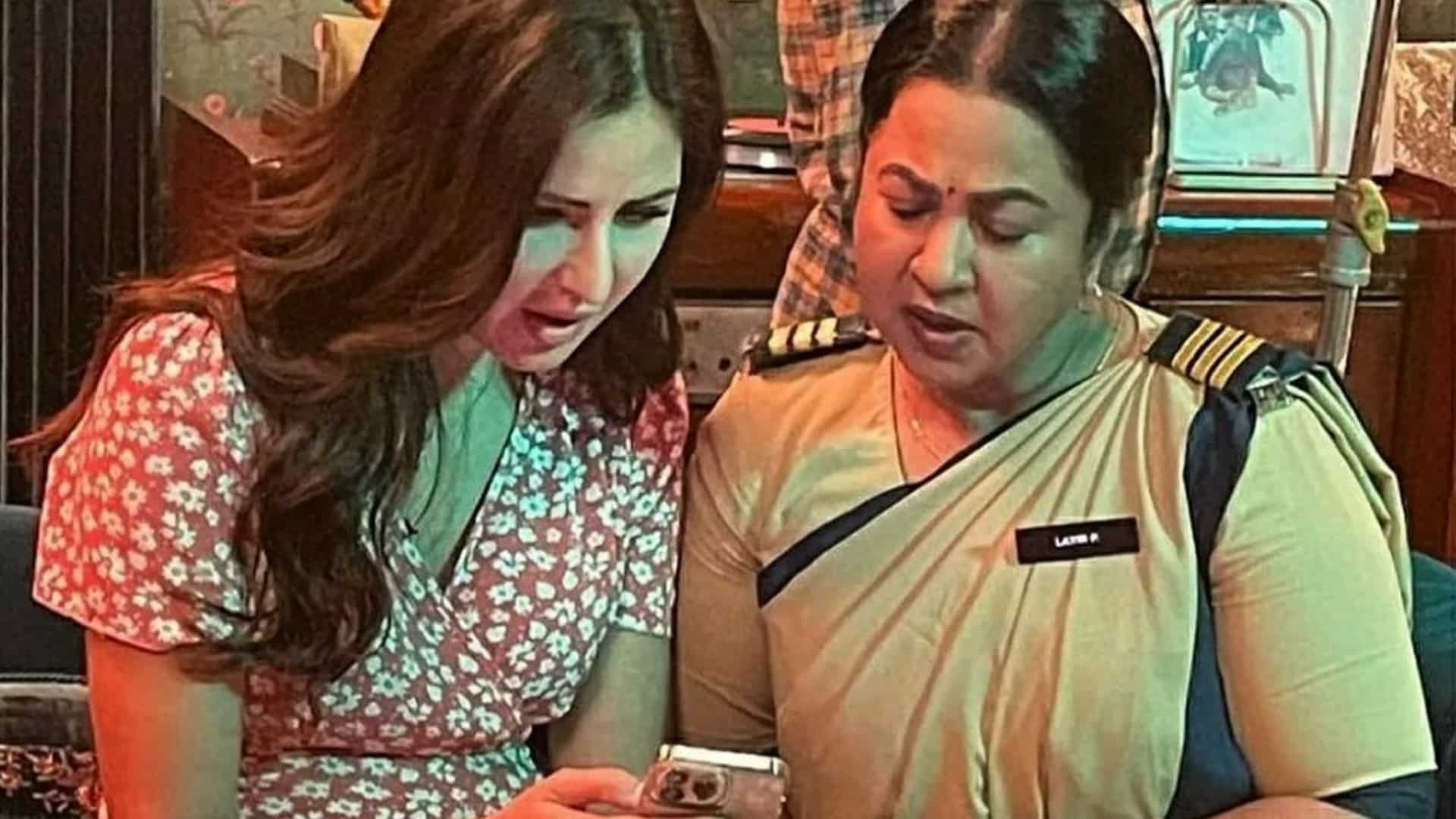 What are Katrina Kaif and Raadhika Sarathkumar looking at?