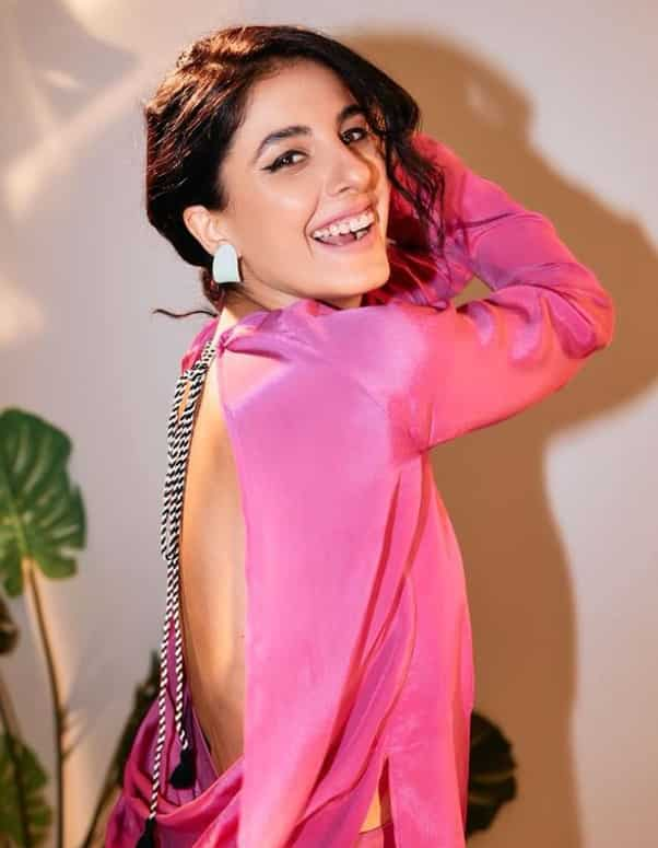 The actress sported the all-pink backless suit-pant to slay at a Mirzapur event.