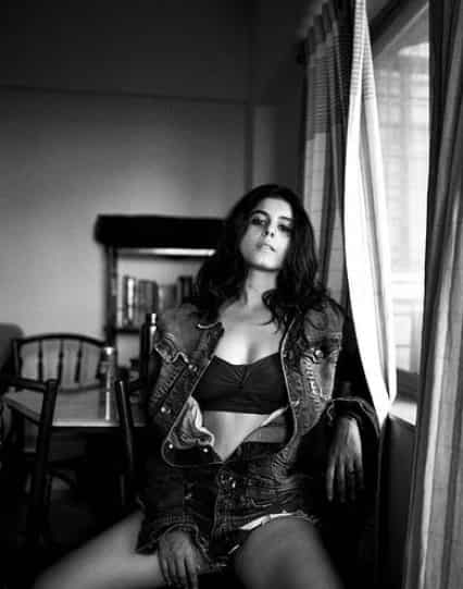 The diva slays in another monochrome picture sporting a black tube top inside a huge denim jacket and denim shorts.