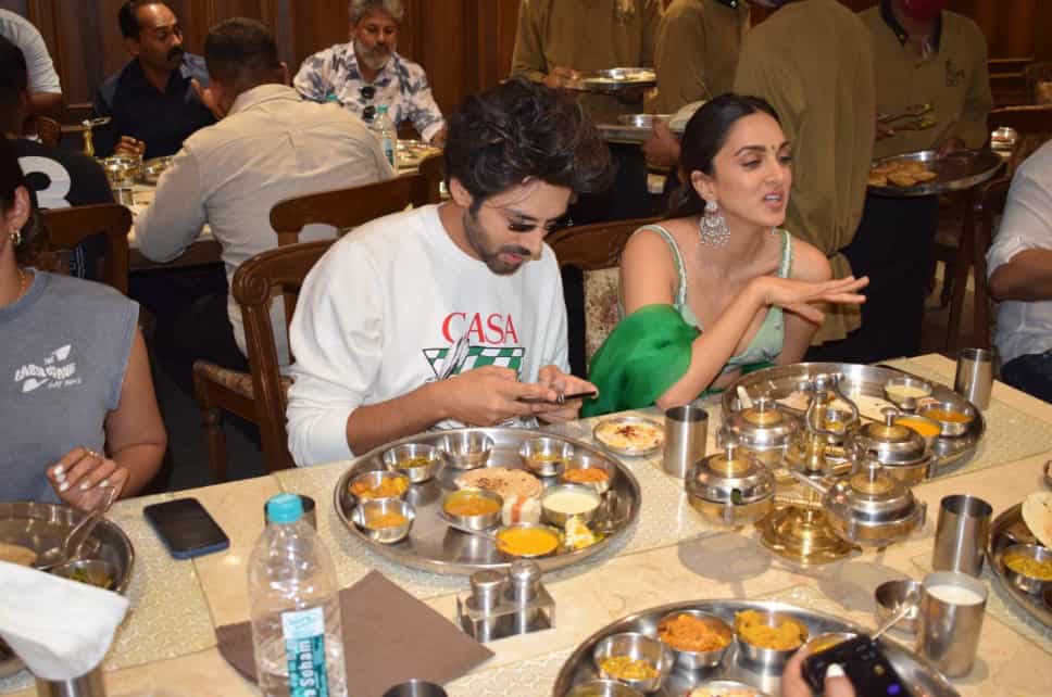 Kartik was spotted taking pictures of his huge Gujarati thali in a jam-packed restaurant in the city.