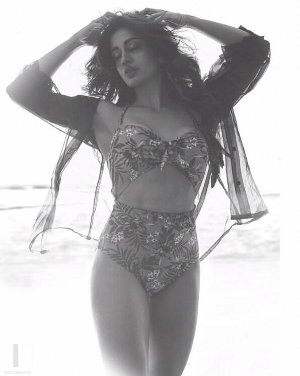 Nehha's flowery two-piece bikini with a sexy shrug gives a major beach wear inspiration.