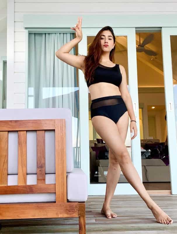 The Woh Apna Sa actress shines in a black two-piece bikini.