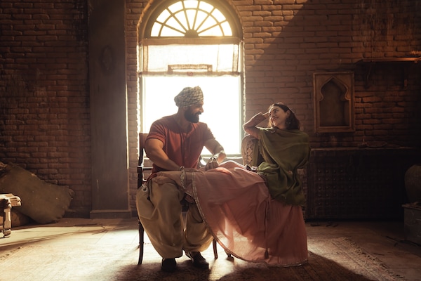 John Abraham and Aditi Rao Hydari in a still from Sardar Ka Grandson