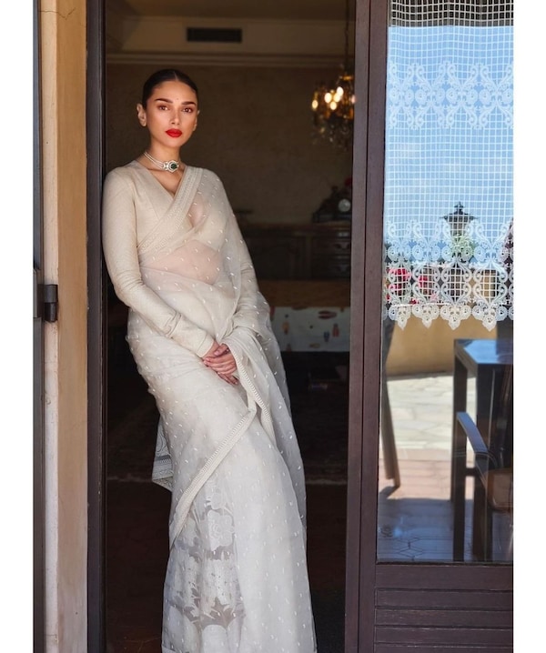 1. Aditi in her elegant white saree