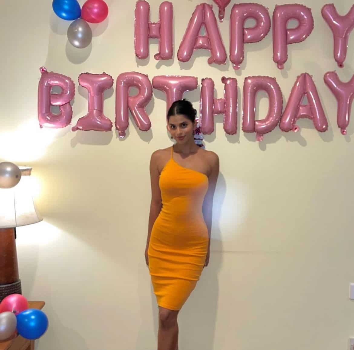 1. Suhana Khan in her orange bodycon dress