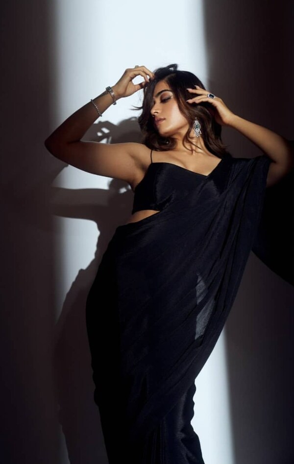 Rashmika Mandanna looks stunning in a black saree