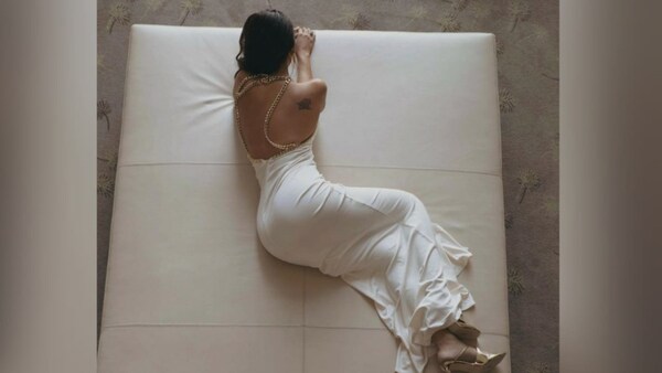 Esha Gupta flaunts her body in white gown