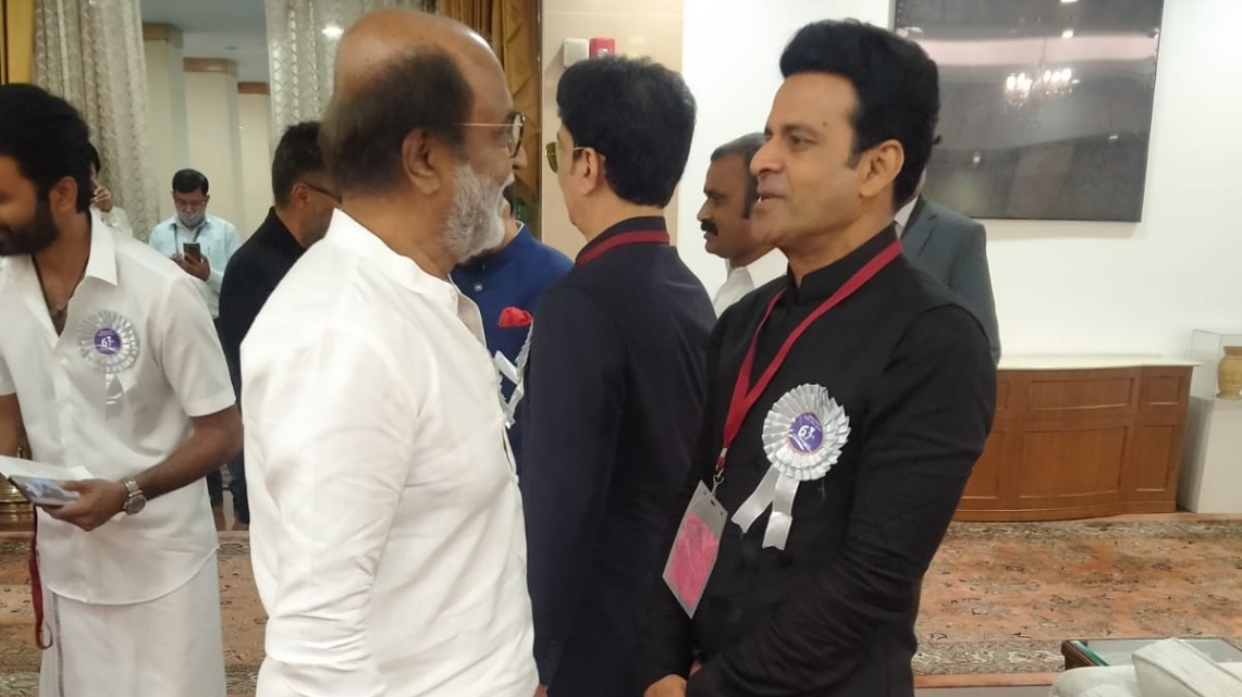 Rajinikanth and Manoj Bajpayee at the event