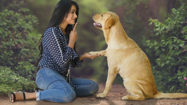 Sangeetha and Charlie in a still from the film