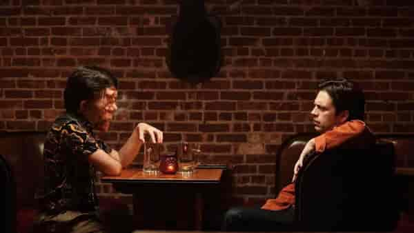 Sebastian Stan (right) and Adam Pearson (left) in a still from A Different Man.