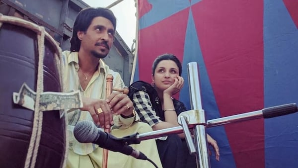Parineeti Chopra and Diljit Dosanjh in a still from Amar Singh Chamkila. Netflix