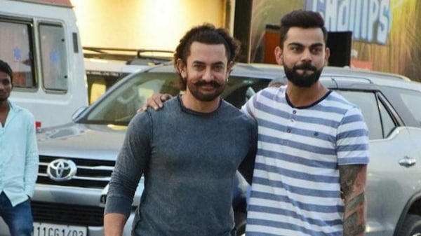 Aamir Khan and Kohli during a promotional event in 2019. Image | Hindustan Times