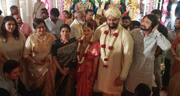 The newly-weds with Kiccha Sudeep, his wife Priya and daughter Saanvi