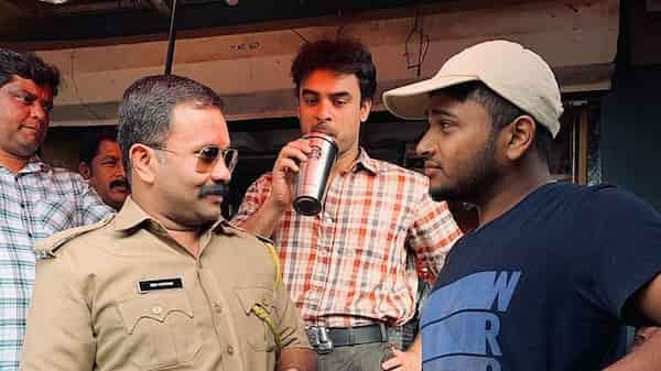 Aju Varghese, Tovino Thomas and Basil Joseph on the sets of Minnal Murali