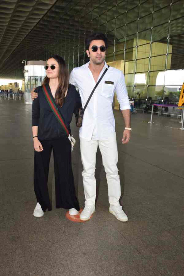 Alia Bhatt and Ranbir Kapoor keep cool at Mumbai airport.