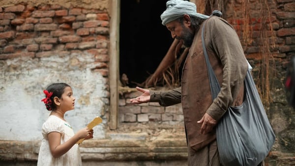 Anumegha Kahali and Mithun Chakraborty in Kabuliwala