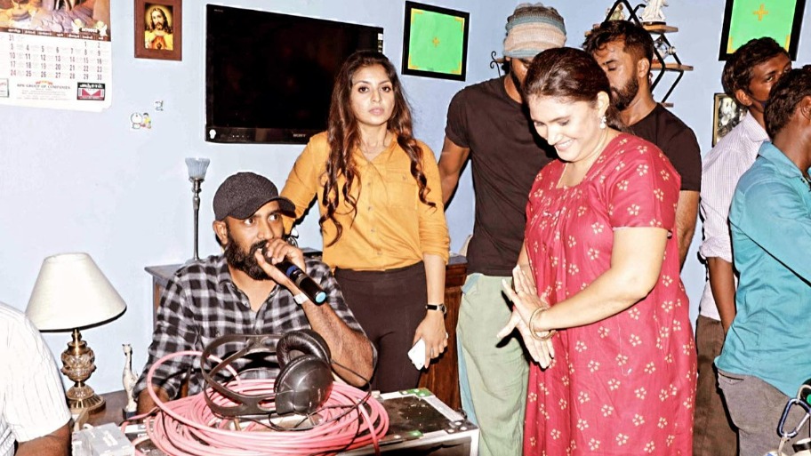 Director Zac Harriss and Athmiya during the shoot of the film