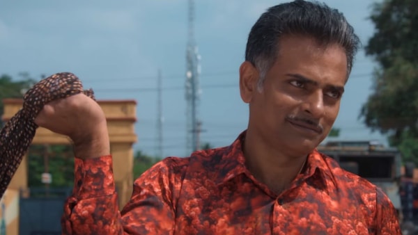 Alphonse Puthren as Soda Babu in Balti