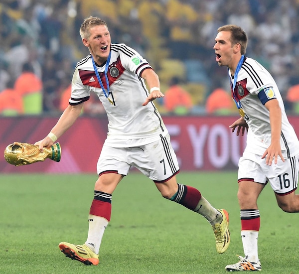 Bastian Schweinsteiger and Philipp Lahm celebrating the 2014 FIFA World Cup win. Image | Philipp Lahm on X