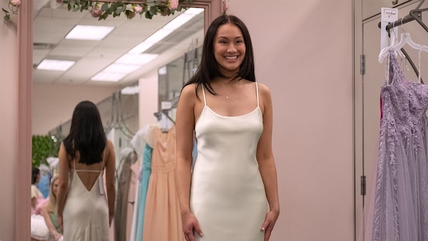 Belly says yes to the dress.