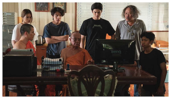 A behind-the-scene photo of the team of The Believers