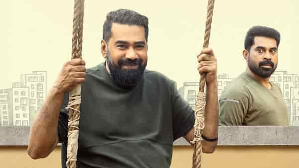 Biju Menon and Suraj Venjaramoodu in a poster of Nadanna Sambhavam