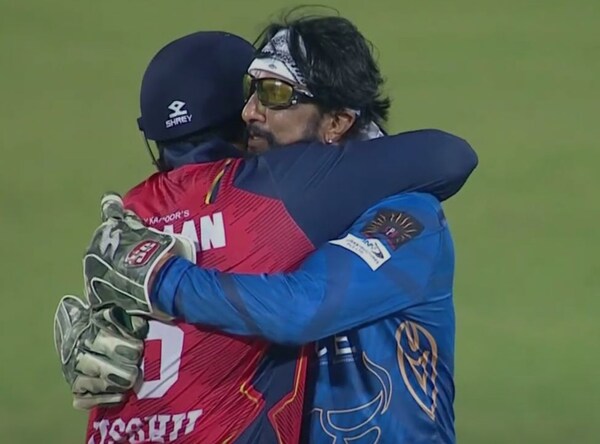 Birthday boy Jisshu Senguptha gets a hug from Kiccha Sudeep