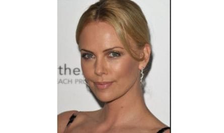 How did Charlize Theron get her break in Hollywood?