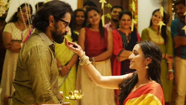 Vikram and Srinidhi Shetty in a still from the film