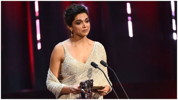 BAFTA 2024 - Deepika Padukone presents the Film Not in the English Language Award on stage to...