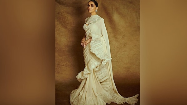 Deepika Padukone in an off-white saree