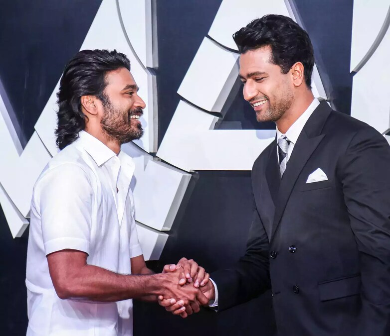 Dhanush attends The Gray Man premiere with sons Linga, Yathra. See