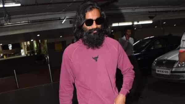 Captain Miller star Dhanush ups his beard game as he heads to Mumbai