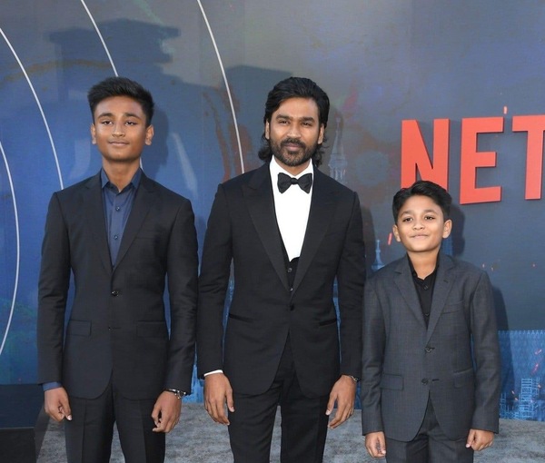 Dhanush attends the screening of The Gray Man with sons Yatra and Linga