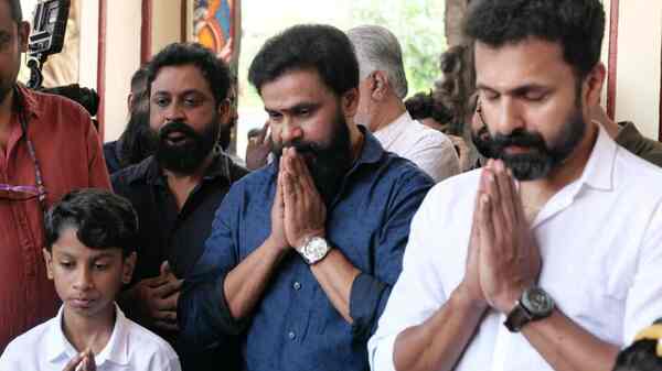 Dileep and Vineeth Kumar at the pooja function