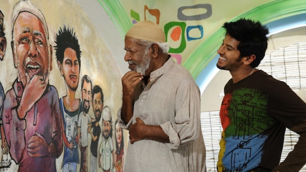 Dulquer and Thilakan as Faizy and Kareem ikka in a still from Ustad Hotel