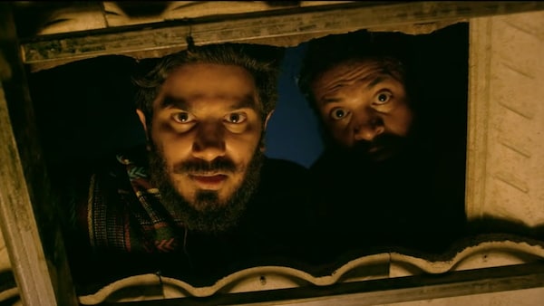 Dulquer Salmaan and Soubin Shahir in a still from Charliev