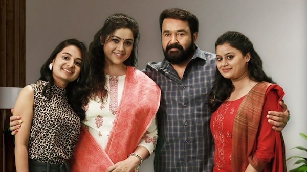 Esther Anil, Meena, Mohanlal and Ansiba in a still from Drishyam 2