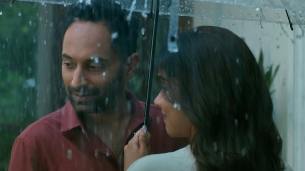 Fahadh Faasil and Kalyani Priyadarshan in Odum Kuthira Chaadum Kuthira
