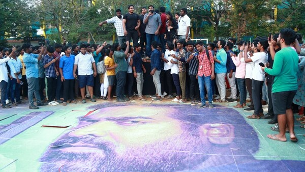 Students gather at the poster launch of Farzi 