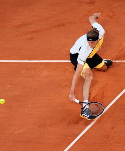 Alexander Zverev risked a repeat of his 2022 ankle injury with this slide to tackle a Casper Ruud drop shot