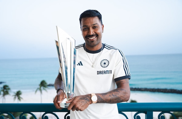 Hardik Pandya with the 2024 T20 World Cup. Image | BCCI on X