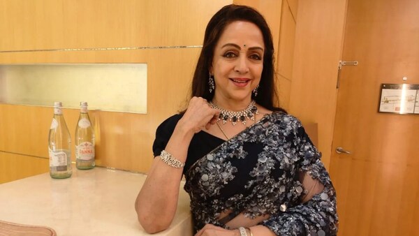 Hema Malini admits it was 'embarrassing' to sit on Dev Anand's lap during Johny Mera Naam's shoot