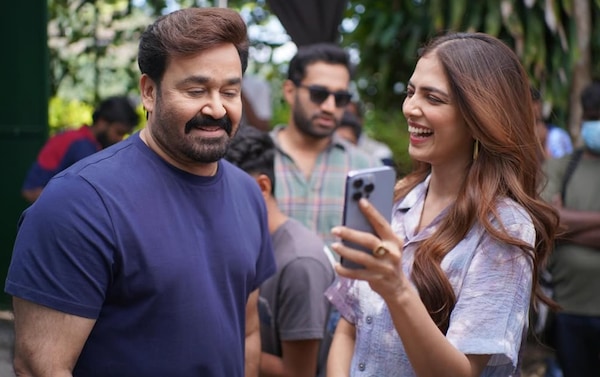 Malavika Mohanan with Mohanlal on the set of Hridayapoorvam